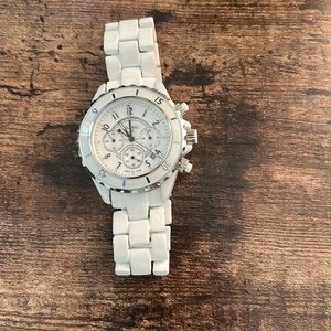 White silver tone Chanel watch